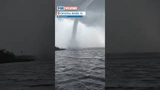 Florida Waterspout Comes On Shore As Tornado Lofts Debris Into Air [upl. by Aimal248]