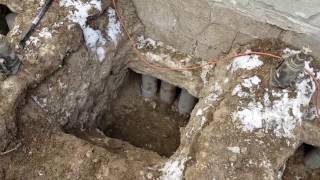 Releveling Concrete Foundation using Concrete Pilings [upl. by Akinihs]