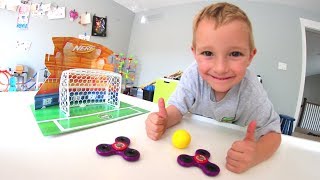 FATHER SON MINI SOCCER TRICK SHOTS  Fidget Spinners [upl. by Fosque]