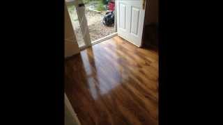 Laminate Flooring by Perfection Flooring BeveLOC Walnut Gloss Laminate Installation [upl. by Beekman333]