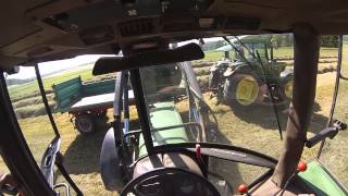 1 Schnitt  Heuernte 2014 mit John Deere und Fendt [upl. by Haelem90]