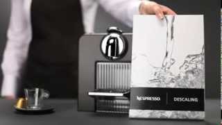 Как очистить от накипи кофемашину Le Cube Nespresso  RU [upl. by Drehcir]