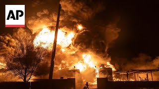 Russian drone strike sets off huge fire in Ukraines Kharkiv [upl. by Aicert]