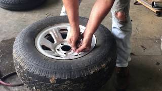 Mounting a car tire on a rim with NO TOOLS in seconds [upl. by Charyl]