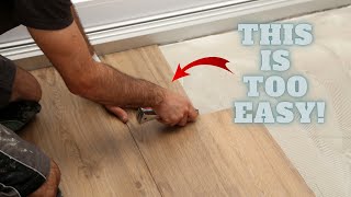 Rigid Core Vinyl Plank Floors Installed Professionally  Step by Step  101 with GoPro [upl. by Adnamar698]