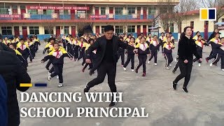 Chinese school principal teaches students shuffle dance during break [upl. by Aivatan]