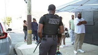 Philadelphia cheesesteak shop hires armed agents to protect customers outside [upl. by Ettenoitna]