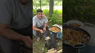 Cooking dinner outsidechiassonsmoke husbandwife cooking outdoors [upl. by Wiese]