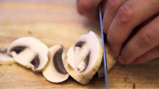 Knife Skills How To Slice Mushrooms [upl. by Aierdna446]