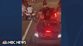 Viral video shows biker smash windshield then pull gun on driver [upl. by Ellenej]