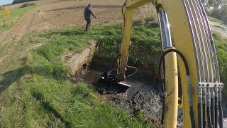 Clearing The Culvert And And Desilting The Drainage Ditch With An Excavator [upl. by Elfrida293]