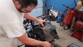 How to clean and rebuild the carburetor in a Yamaha Bear Tracker 250 [upl. by Elleved544]