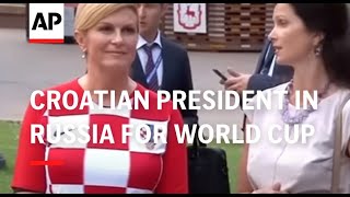 Croatian president in Russia for World Cup match [upl. by Dillie127]