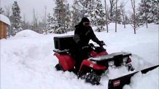 ATV Plowing 3 Feet of Snow Kawasaki Prairie 400 [upl. by Calandria]