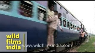 Much too close to a moving train in India [upl. by Cantu]