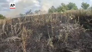 Ukrainian firefighters come under shelling in Donetsk [upl. by Alberta]