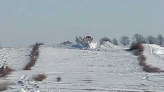 Motor Grader going thru a snow drift [upl. by Hussar296]