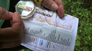 Taking a bearing using a compass while orienteering [upl. by Vikky118]