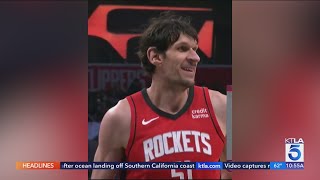 Houston Rockets Boban Marjanović appears to intentionally miss free throw to give Clippers fans free [upl. by Retlaw]