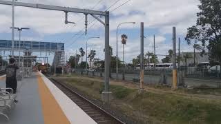 Aurizons 2391 2353 and 2801 pass Strathpine Station with Y239 loaded Railset and empty spoiler [upl. by Tugman]