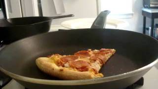 Reheating Leftover Pizza In A Frying PanSkillet [upl. by Nnyliram]