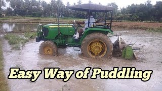 How to puddle soil for growing paddy Puddling of rice field using tractor and rotovator [upl. by Ringsmuth]