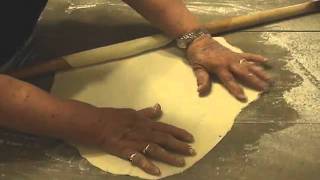 how to make spanakopita  how to thin out phyllo dough using a rolling pin  myGreekRecipescom [upl. by Eicrad718]