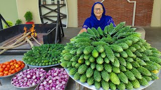 Karela Cooked In Our Traditional Style  Bitter Gourd Recipe  Village Cooking Recipe [upl. by Silecara]