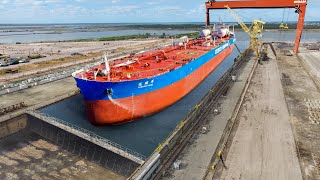 The Impressive Process of Moving Gigantic Ships into Dry Docks [upl. by Oneal]