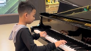 8 year old pianist plays RUSH E In public Hardest piano song in the world [upl. by Pegma]