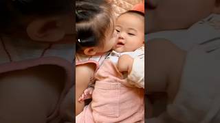 The cute baby is with sister kisses happy to laugh [upl. by Ayom737]