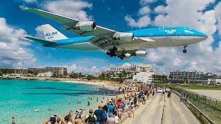 BOEING 747 low LANDING above THE BEACH  St Maarten and Maho Beach 4K [upl. by Nerty370]