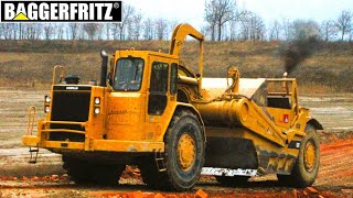 HUGE Caterpillar 637E and 637G motor scrapers are moving dirt [upl. by Tamra]