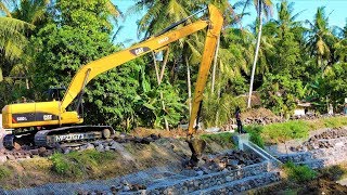 River Bank Reinforcement Construction By Long Reach Excavator CAT 320DL [upl. by Erdnaid142]