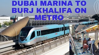 Dubai Metro Train Journey 2022  MDCC Marina to Burj Khalifa Dubai Mall Red Line [upl. by Aihsatsan]