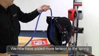 Spring tension adjustment on a hose reel with two arms [upl. by Anazus]