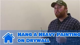 All About Walls  How to Hang a Heavy Painting on Drywall [upl. by Daloris]