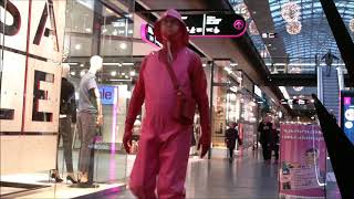 red rubber and pink rainwear at a shopping mall [upl. by Ruprecht]