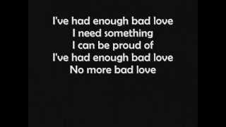 Eric Clapton  Bad Love LYRICS [upl. by Nnayrrehs]