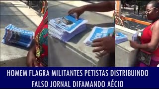 Homem flagra militantes petistas distribuindo falso jornal difamando Aécio [upl. by Zurn]