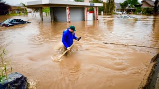 Drain Emergency Unclogging a Flash Flood Street Drain [upl. by Enwahs]