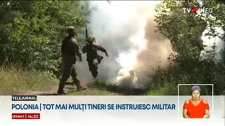 Mulți tineri polonezi își petrec vacanța de vară în tabere militare [upl. by Eceirehs]