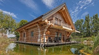 Naturstammhaus TV  Blockhaus in Luzern [upl. by Esiocnarf]