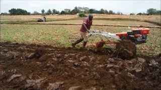 Power tiller operation by plough and ratavator at irrigation farm [upl. by Loise420]