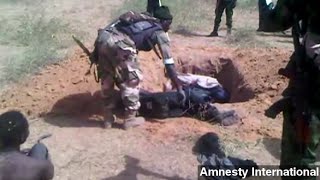 Gruesome Video Allegedly Shows Nigerian Military Abuses [upl. by Alrahs]