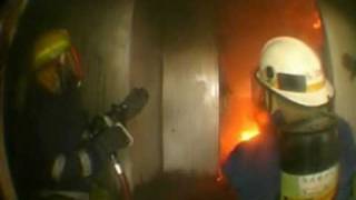 Compartment Fire Behaviour Training in a real structure [upl. by Annodam]