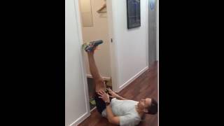 How to stretch your hamstrings wall stretch POGO Physio [upl. by Rainwater]