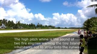 A plane landing at Tuvalus tiny airport in Funafuti in 2013 [upl. by Crista331]