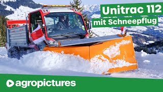 Schnee räumen mit Seitenschneepflug am Lindner Unitrac 112 LDrive  Traktortechnik im Winterdienst [upl. by Burger738]