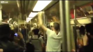 Two Total Strangers Have Saxophone Battle On NYC Subway Train [upl. by Oeht]